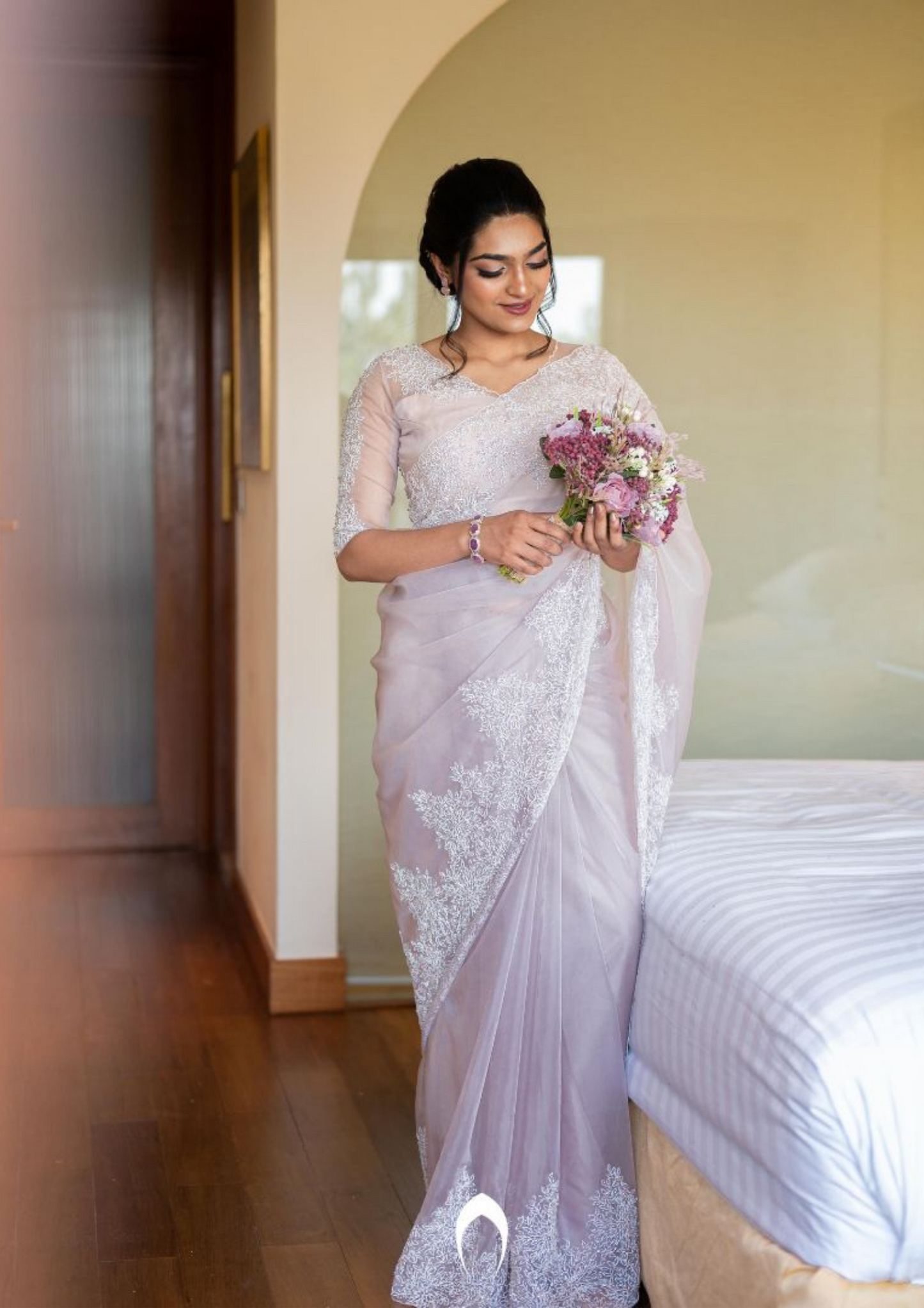 Signature Christian bridal saree in pink with intricate heavy hand embroidery