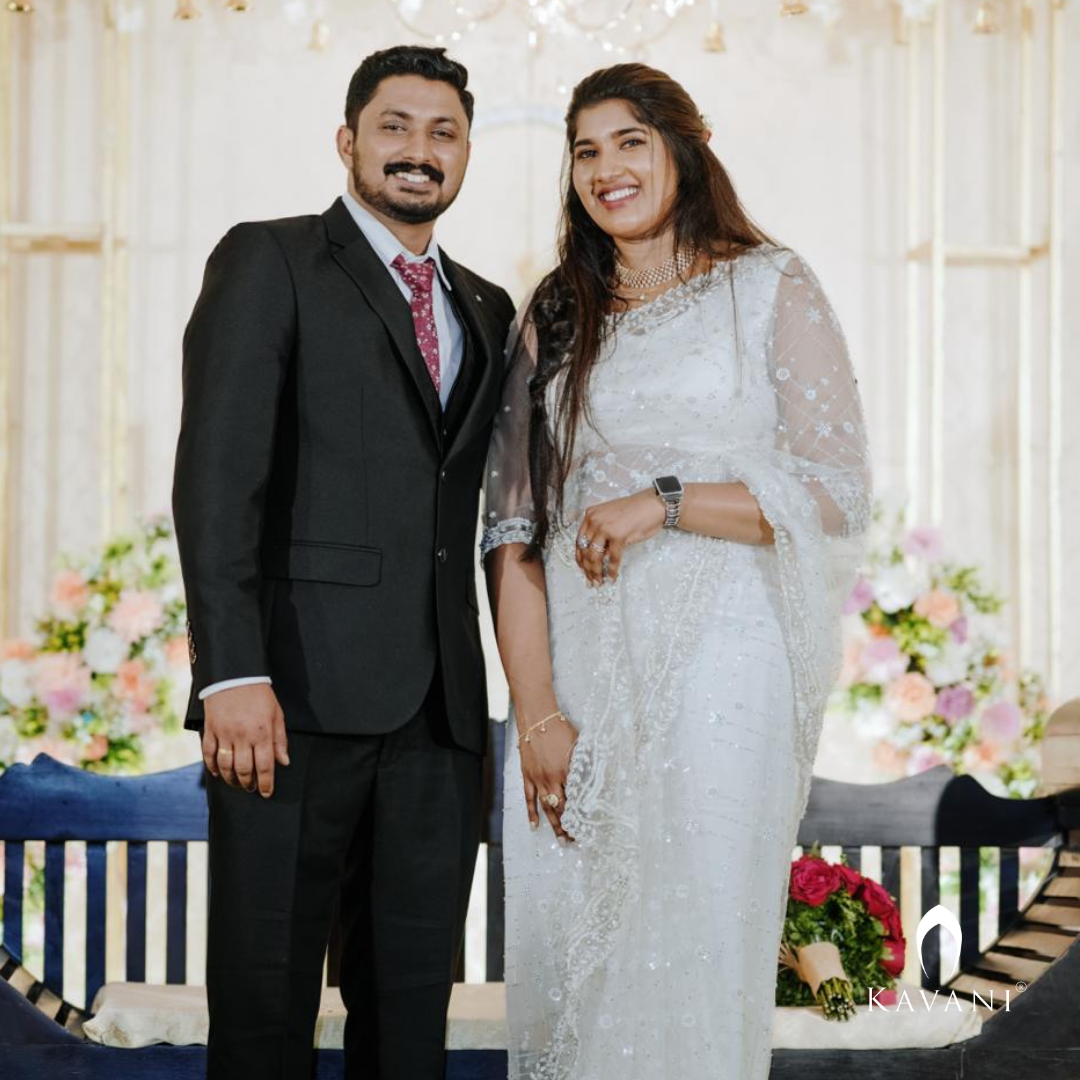 Our beautiful bride in her stunning outlook in her bridal saree with embellished lace and hand embroidery