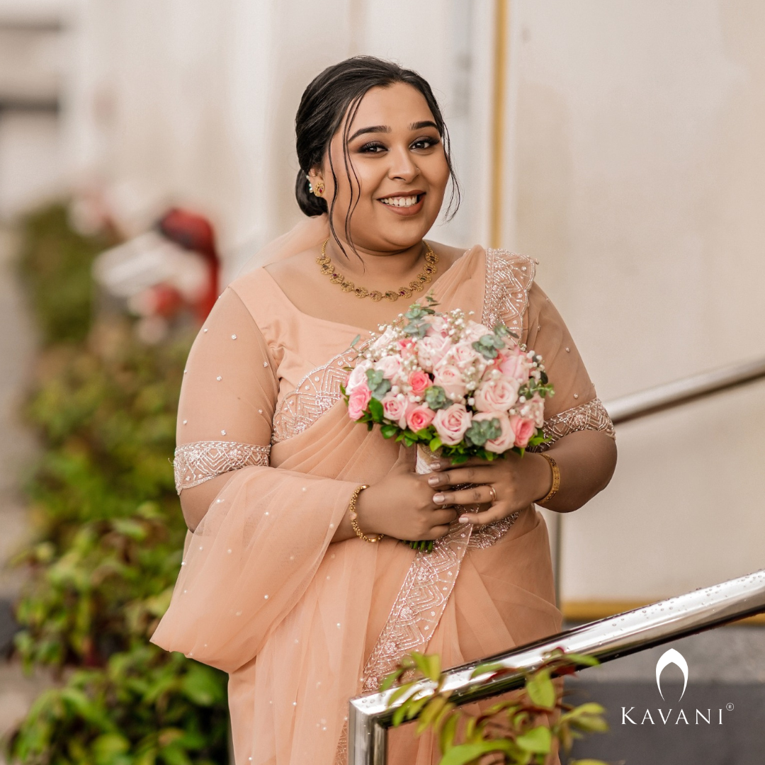 Our beautiful bride in her stunning hand embroidered pastel peach shade saree