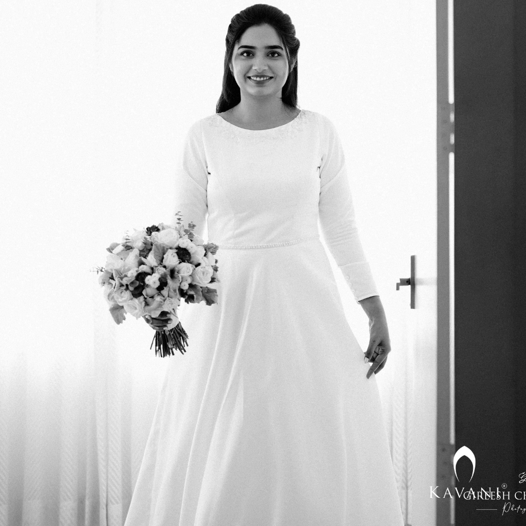 Our beautiful bride in her stunning looking satin aline gown and beautiful lace work