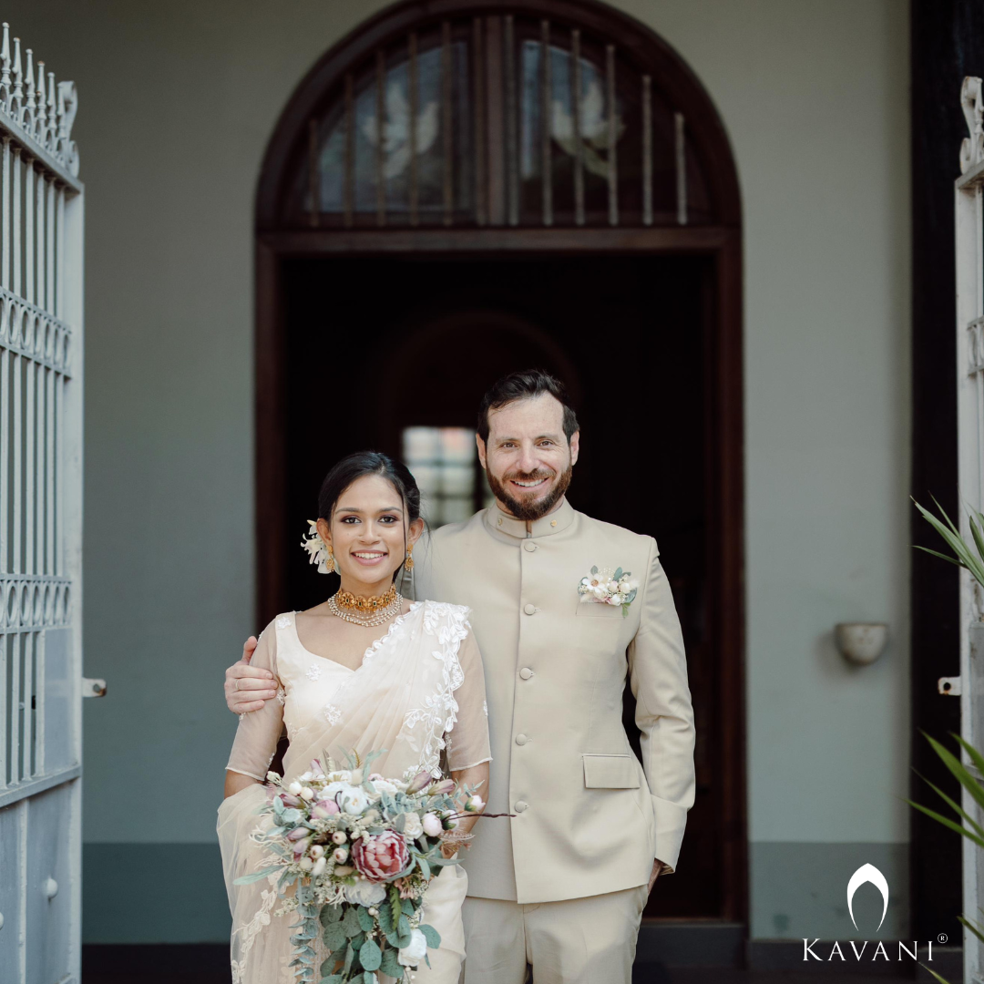 Our beautiful bride in her bridal pastel saree with lace embroidery with long trailing