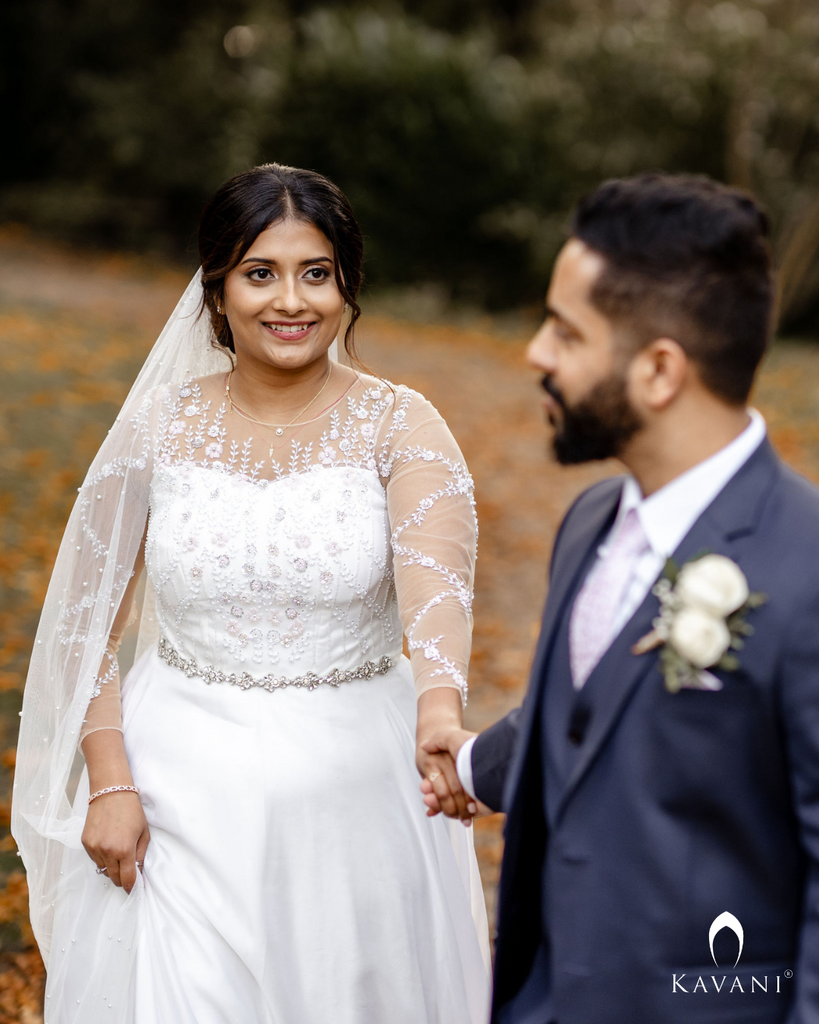 Signature christian Aline net gown with hand embroidery