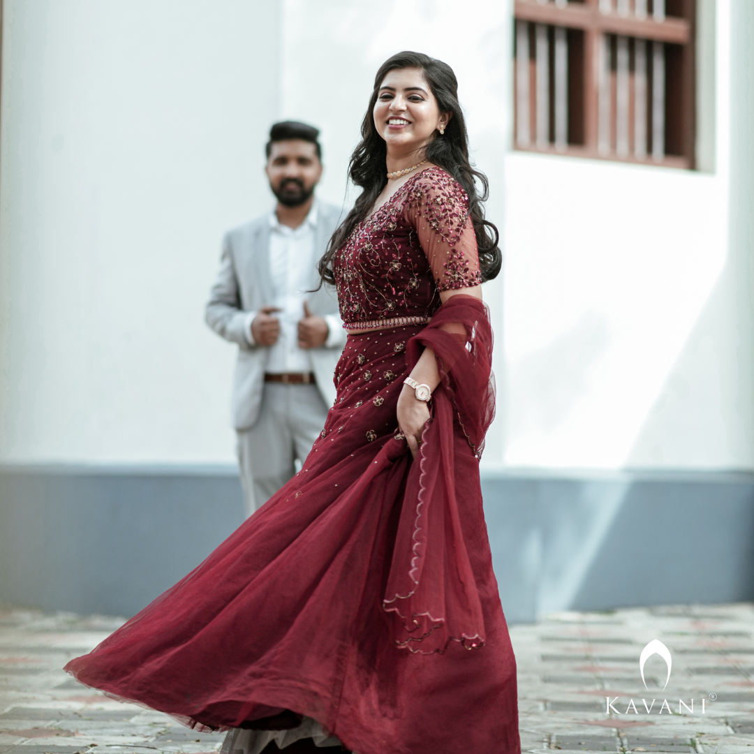 Our beautiful bride in stunning in this exclusive hand embroidered lehenga in deep red shade