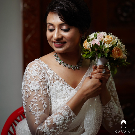 Our beautiful bride in her stunning looking bridal saree showcasing the elegance of hand embroidery