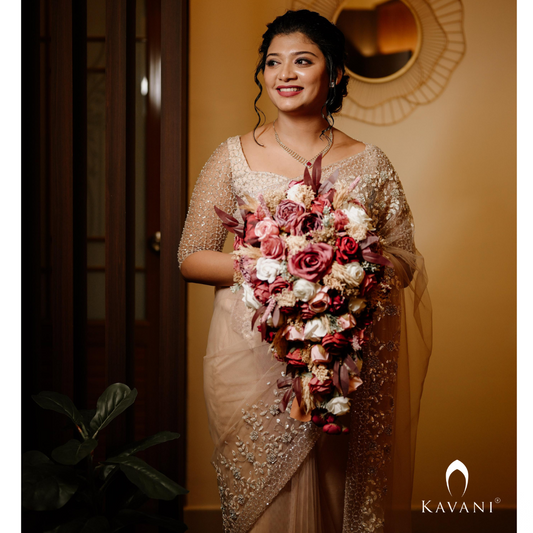 Beautiful bride in her stunning looking bridal saree with lace and hand embroidery