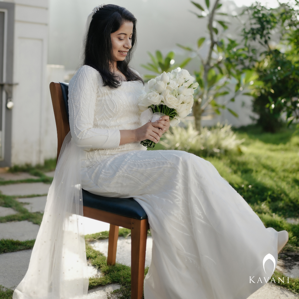 White bridal mermaid gown with beautiful lace work