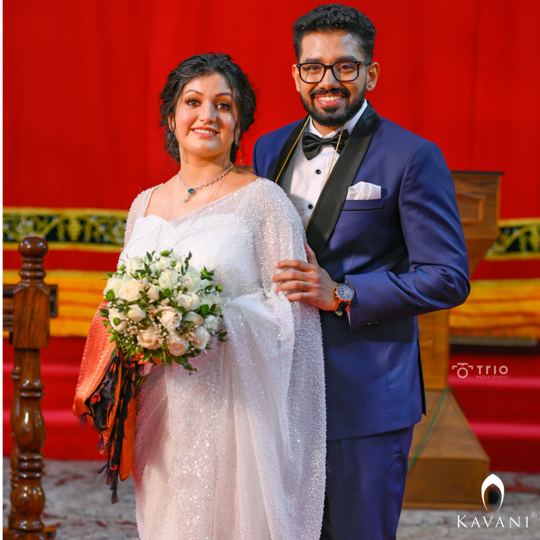 Our bride in her white bridal saree with sequence work with heavy hand embroidey