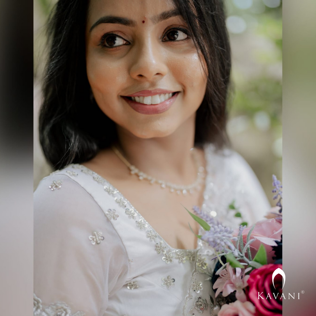 Our bride in her beautiful and stunning looking outlook wearing her bridal organza saree with machine embroidery and hand embroidery