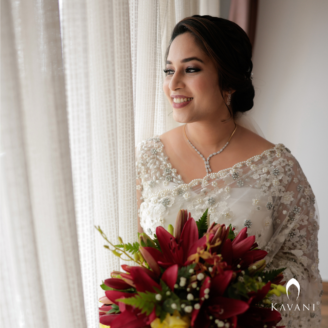 Our pretty bride in her stunning bridal saree with fully hand embroidered