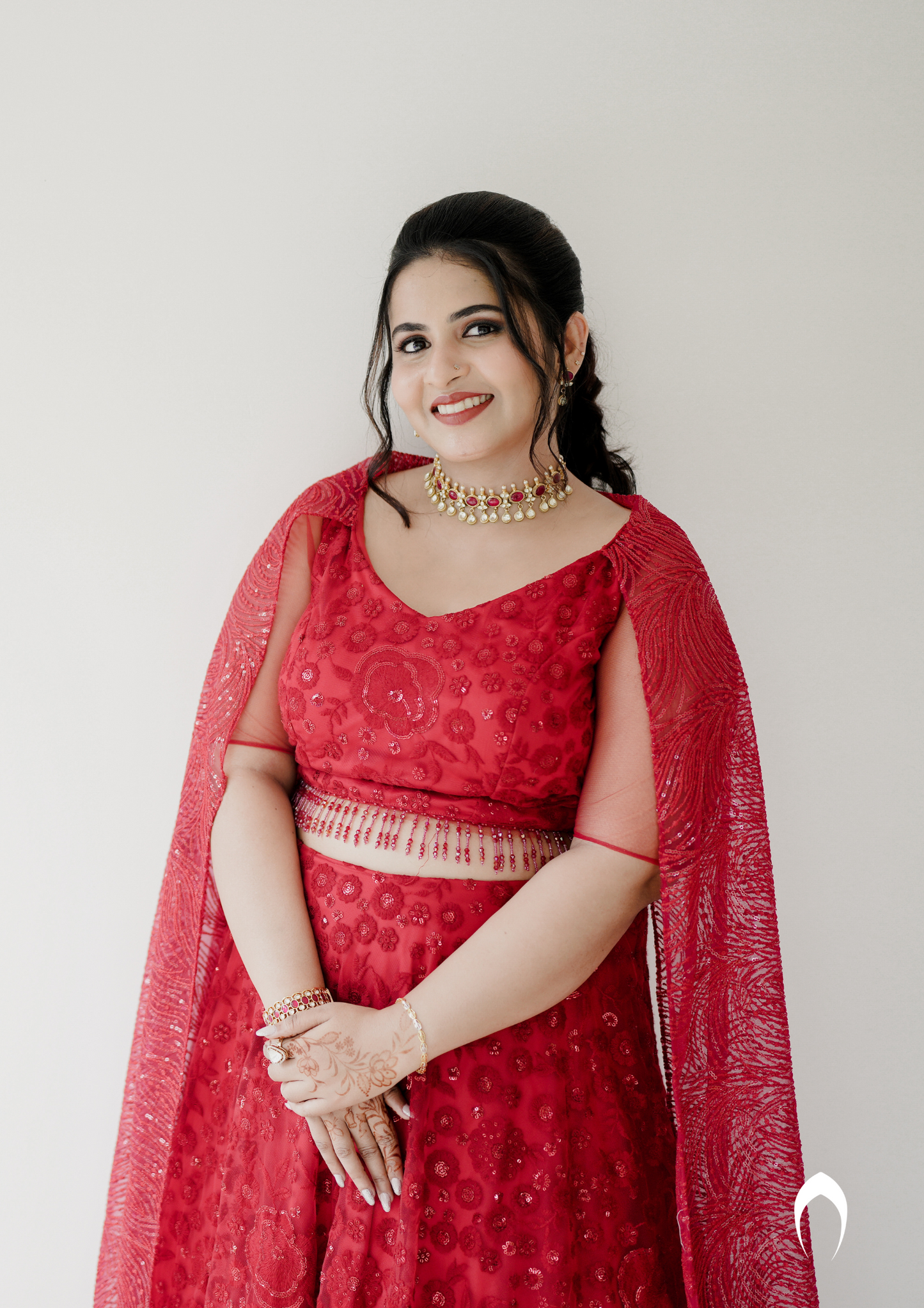 Signature bridal  lehanga in bright red with trailing sleeve