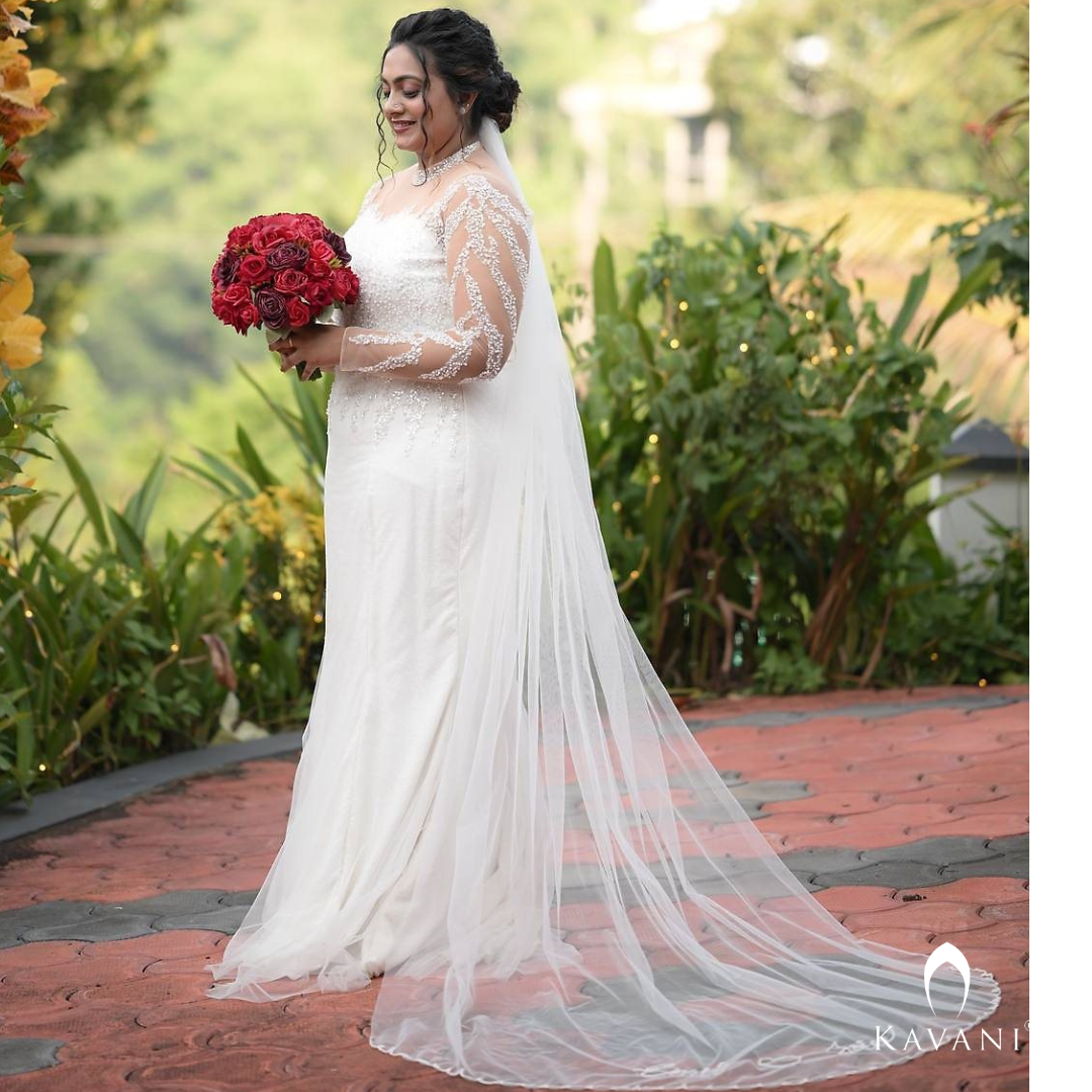 Off white bridal mermaid gown with beautiful and elegant lace work