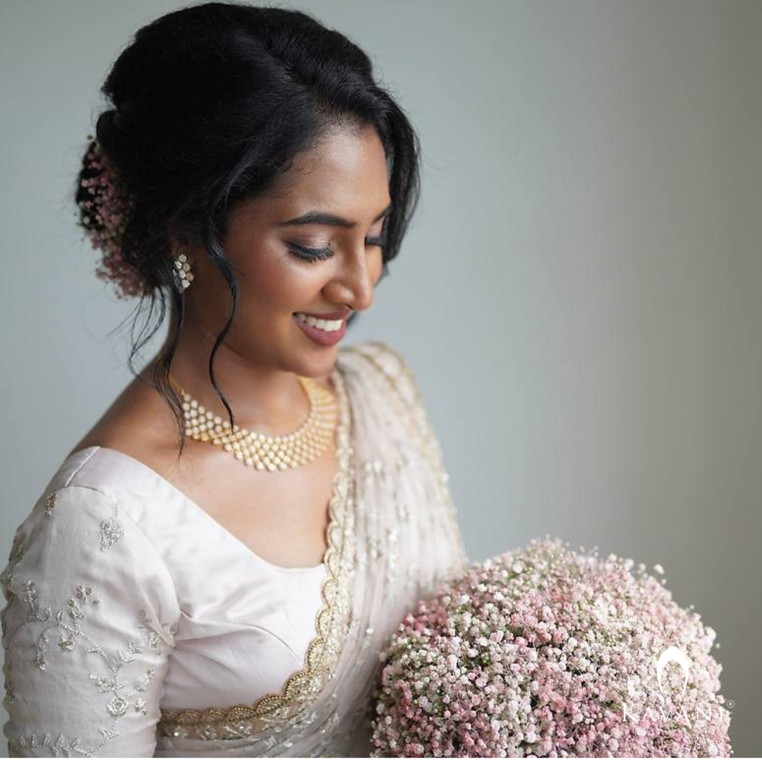 Our beautiful bride showing her elegance of her bridal outlook with beautiful bridal organza saree  with complete thread embroidery and enhancing hand embroidery work