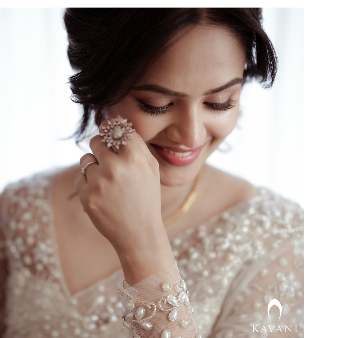 Our beautiful bride in her white bridal saree and elegant and stunning hand embroidery