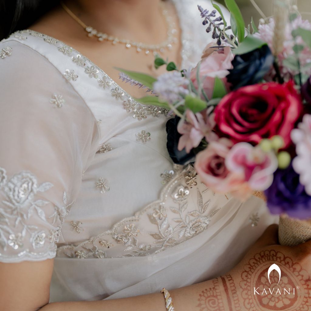 Our bride in her beautiful and stunning looking outlook wearing her bridal organza saree with machine embroidery and hand embroidery