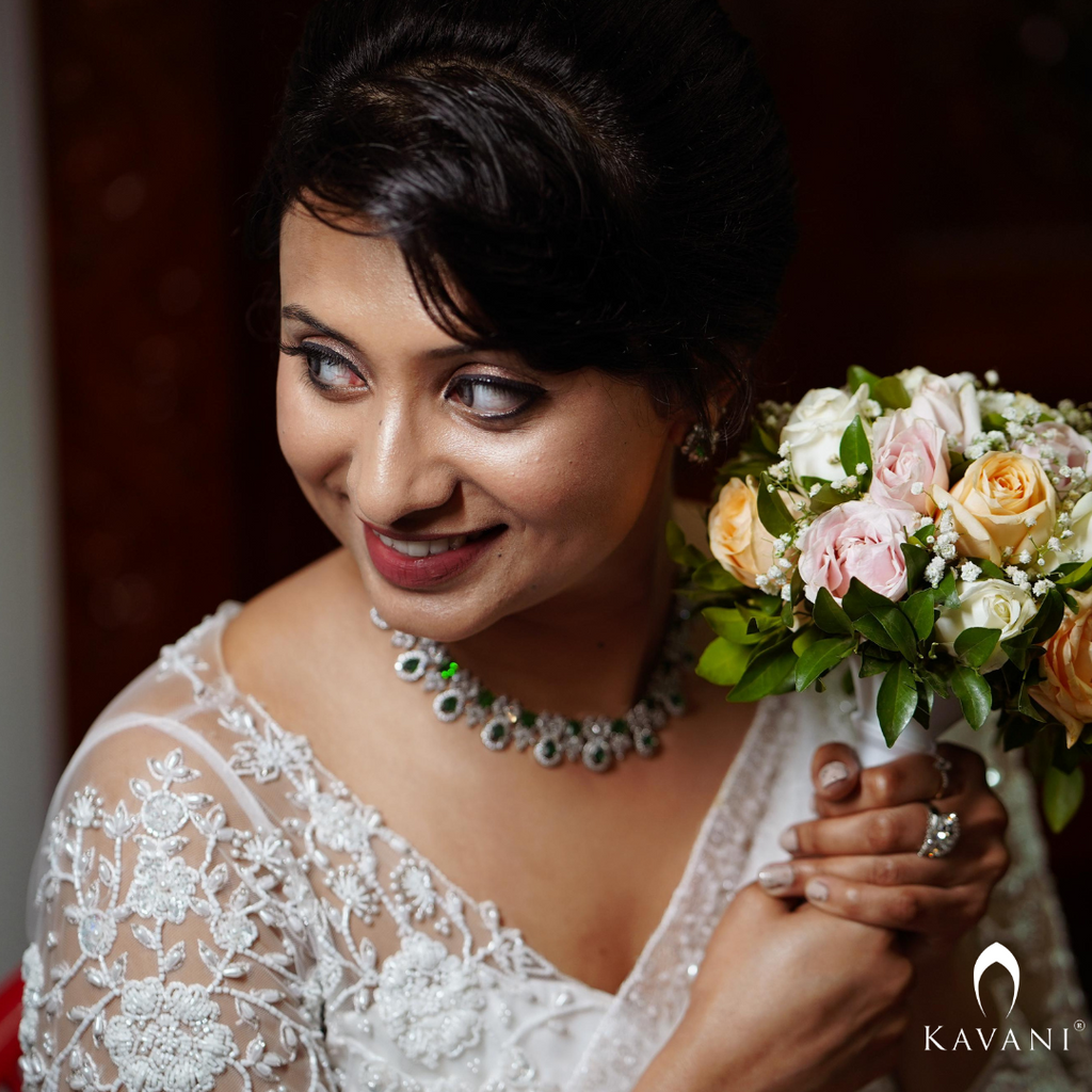 Our beautiful bride in her stunning looking bridal saree showcasing the elegance of hand embroidery