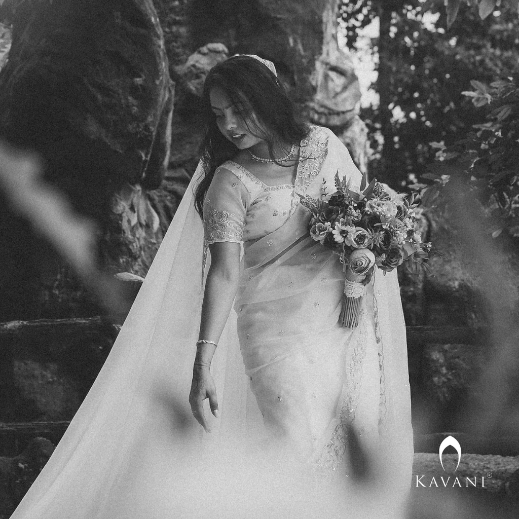 Our bride in her beautiful and stunning looking outlook wearing her bridal organza saree with machine embroidery and hand embroidery