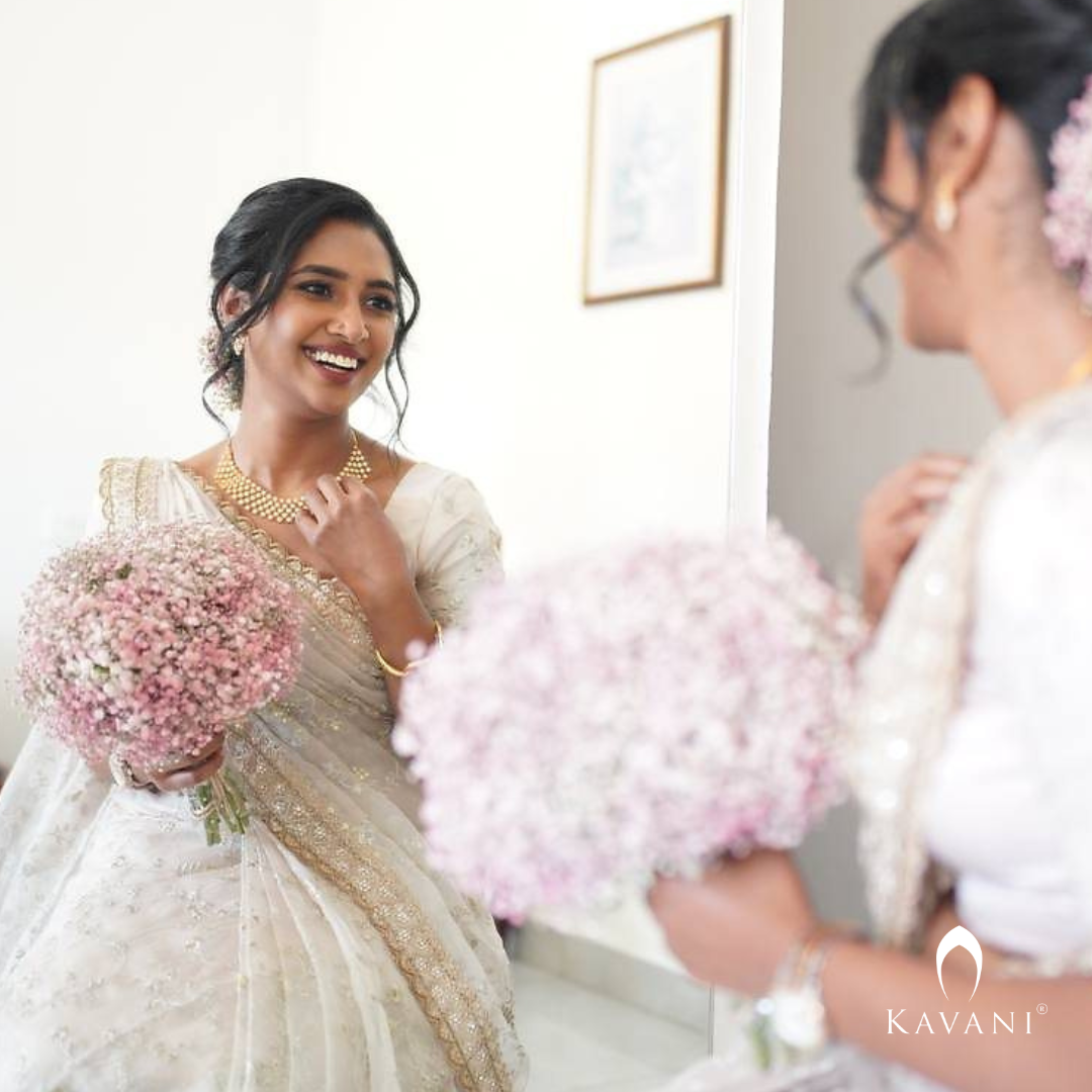 Our beautiful bride showing her elegance of her bridal outlook with beautiful bridal organza saree  with complete thread embroidery and enhancing hand embroidery work