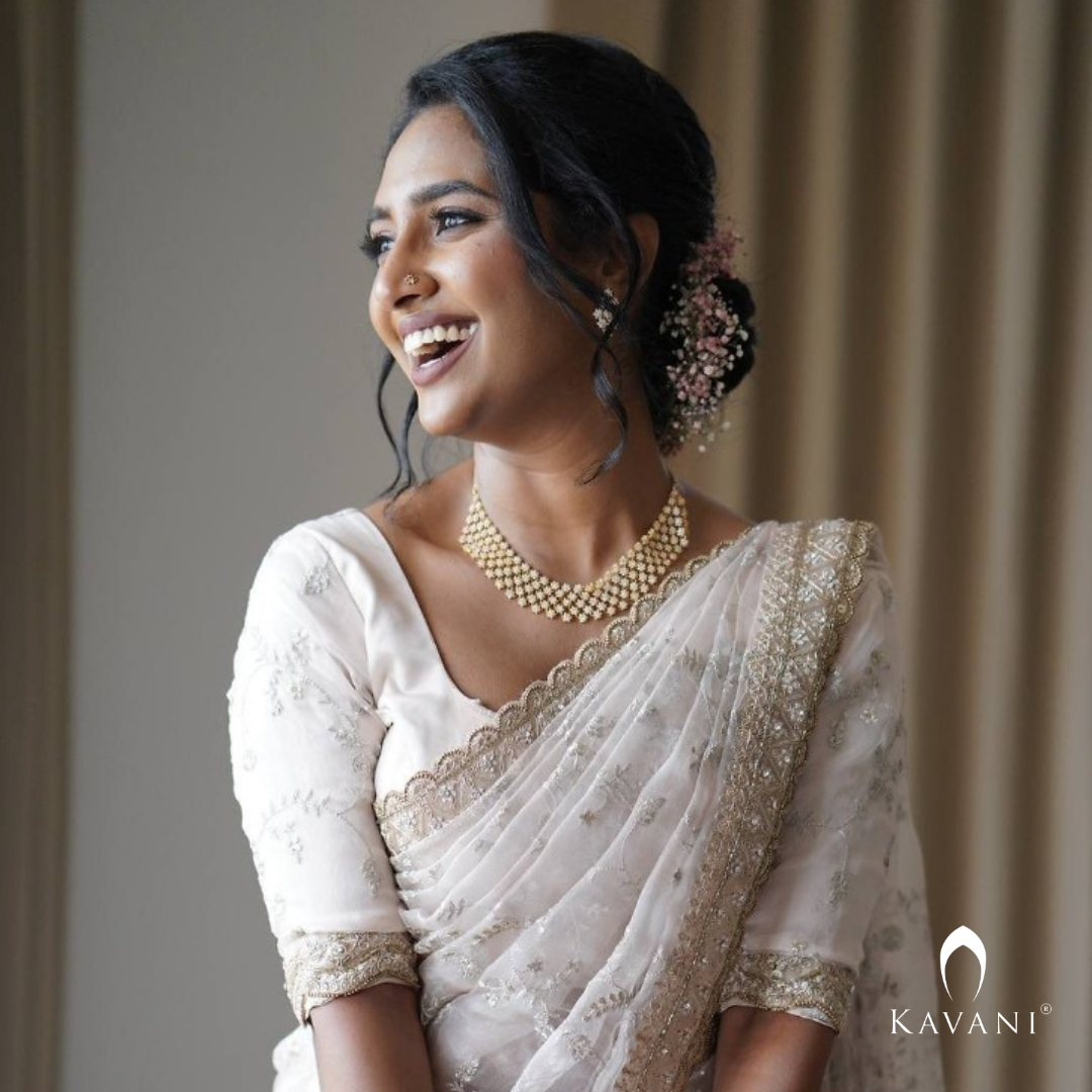 Our beautiful bride showing her elegance of her bridal outlook with beautiful bridal organza saree  with complete thread embroidery and enhancing hand embroidery work