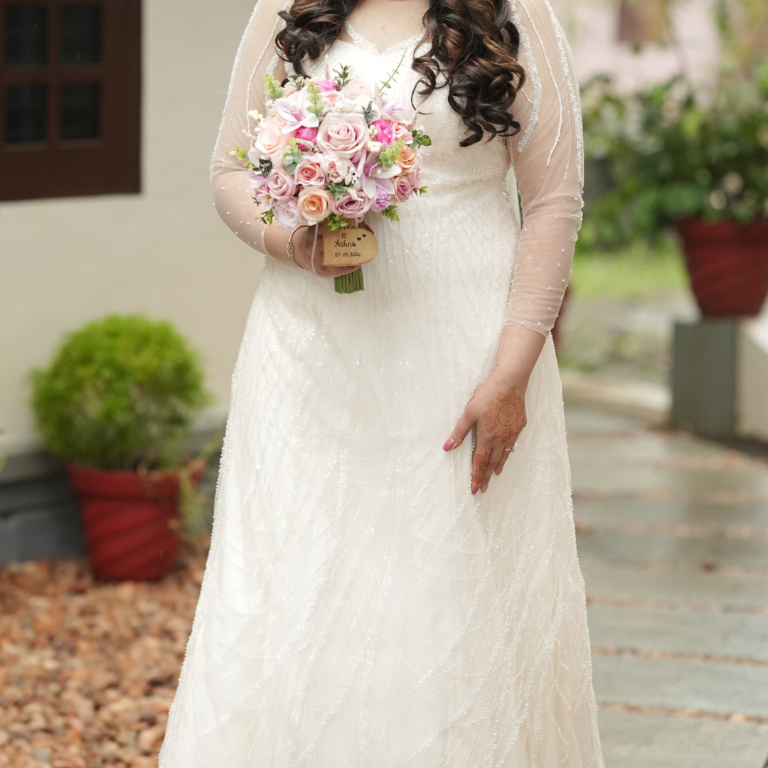 Our beautiful bride in her stunning mermaid gown with fully embellished lace embroidery