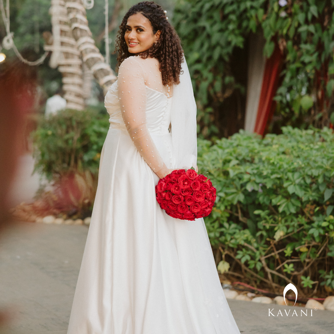 Our bride in her beautiful off white aline gown with pearls work