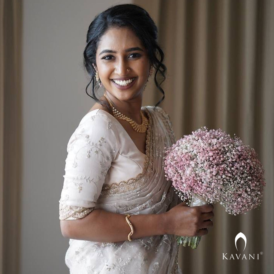 Our beautiful bride showing her elegance of her bridal outlook with beautiful bridal organza saree  with complete thread embroidery and enhancing hand embroidery work