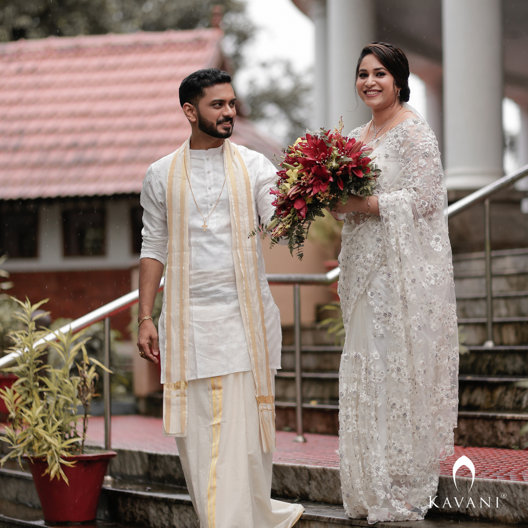 Our pretty bride in her stunning bridal saree with fully hand embroidered