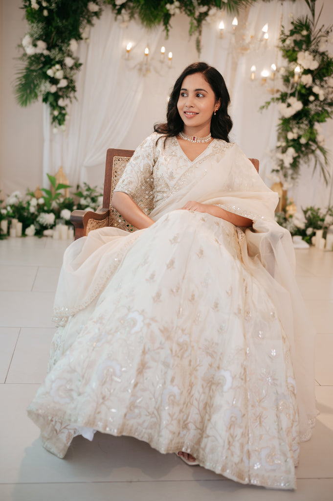 Ivory Lehenga with Intricate Gold & Cream Thread Embroidery