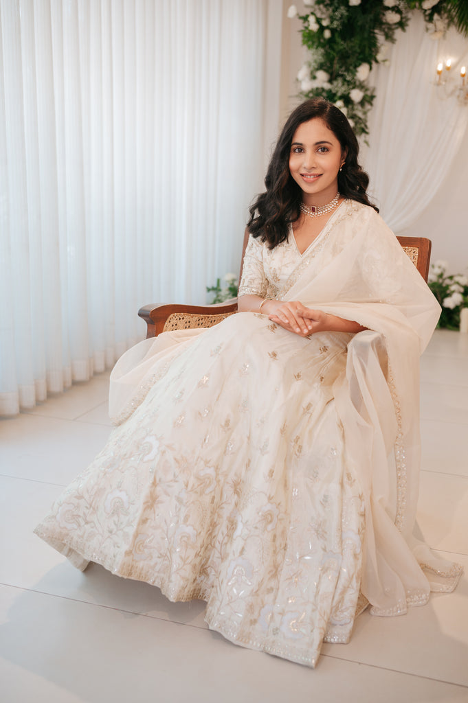 Ivory Lehenga with Intricate Gold & Cream Thread Embroidery