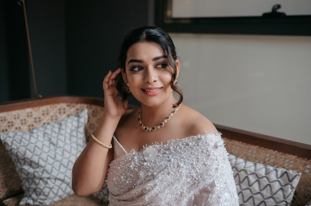 Pearl-Embellished Saree with Chantilly Lace Borders & Cap Sleeve Blouse