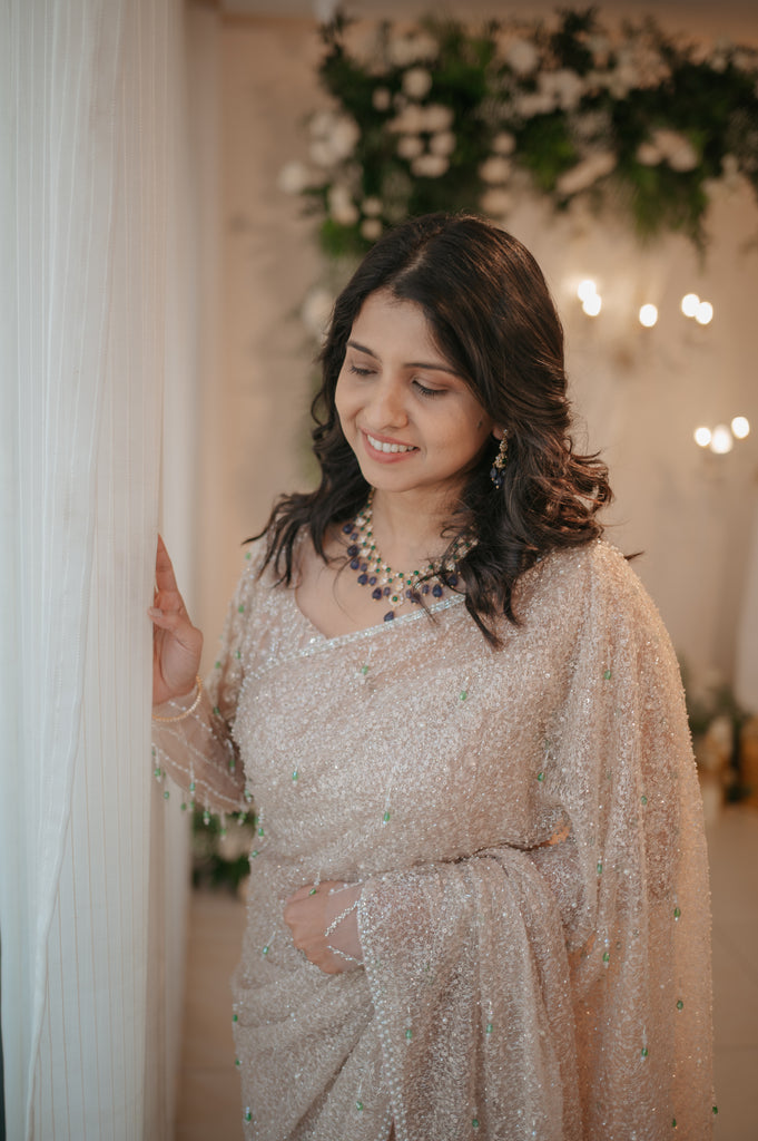 Gold Beaded Saree with Emerald Crystal Accents – Chandelier Collection