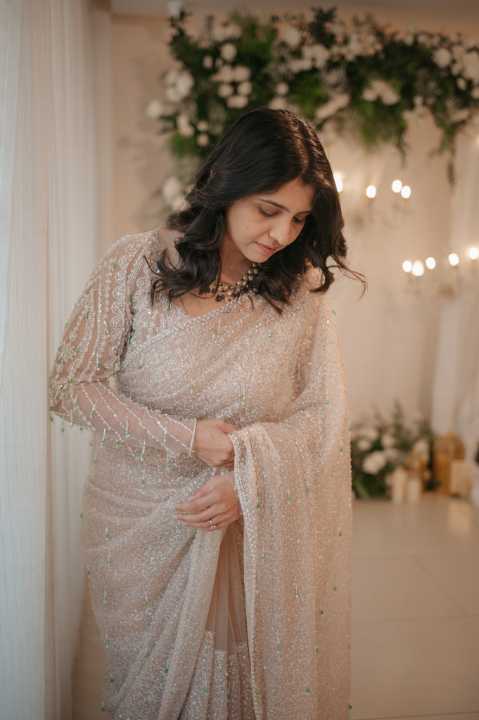 Gold Beaded Saree with Emerald Crystal Accents – Chandelier Collection
