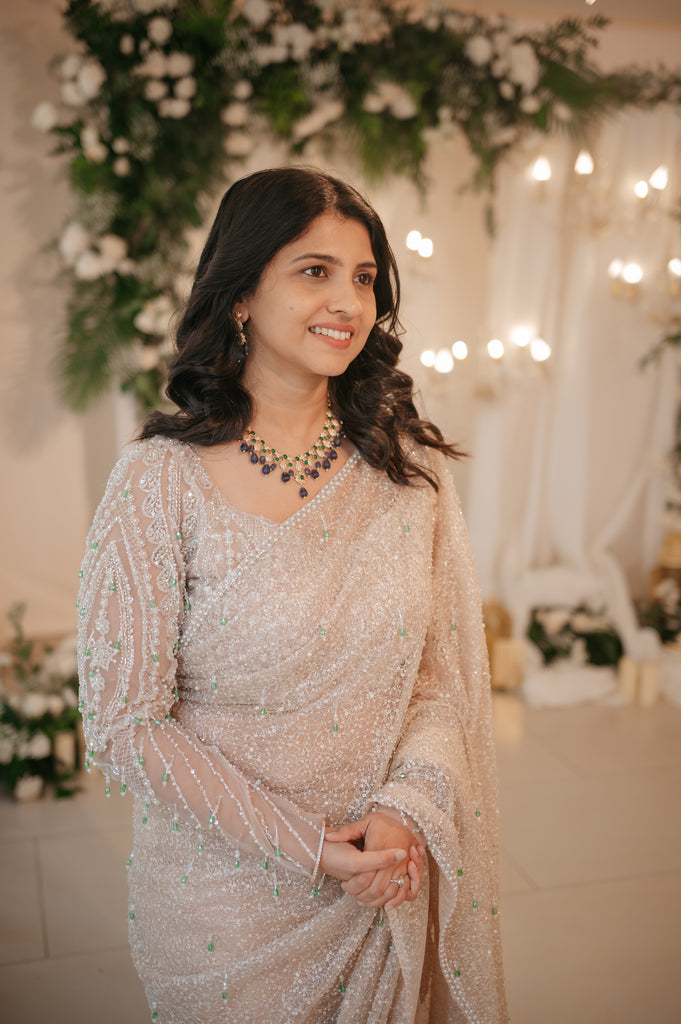 Gold Beaded Saree with Emerald Crystal Accents – Chandelier Collection