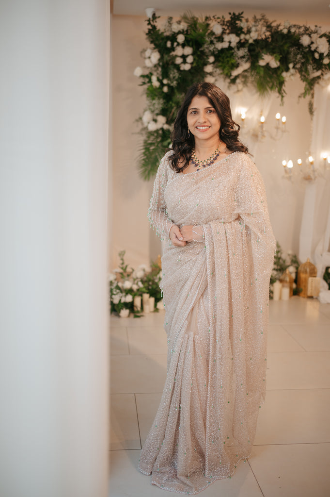 Gold Beaded Saree with Emerald Crystal Accents – Chandelier Collection
