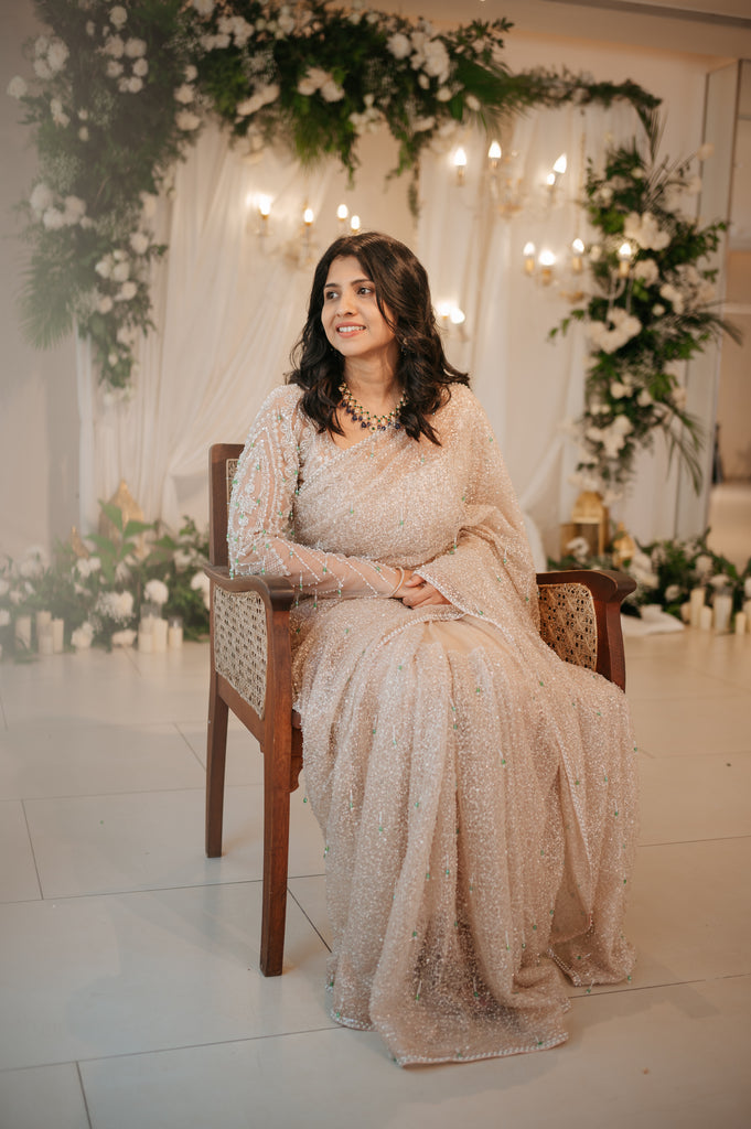Gold Beaded Saree with Emerald Crystal Accents – Chandelier Collection