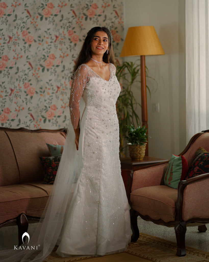 Signature bridal mermaid gown with hand work over the embellished lace fabric