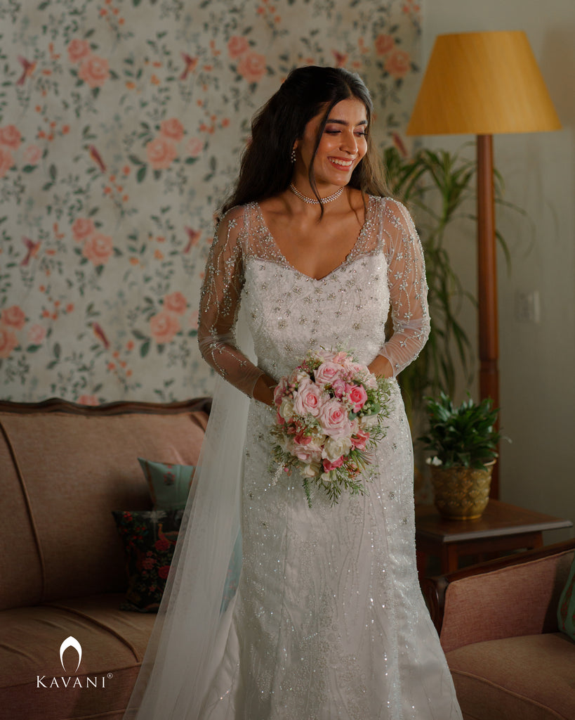 Signature bridal mermaid gown with hand work over the embellished lace fabric