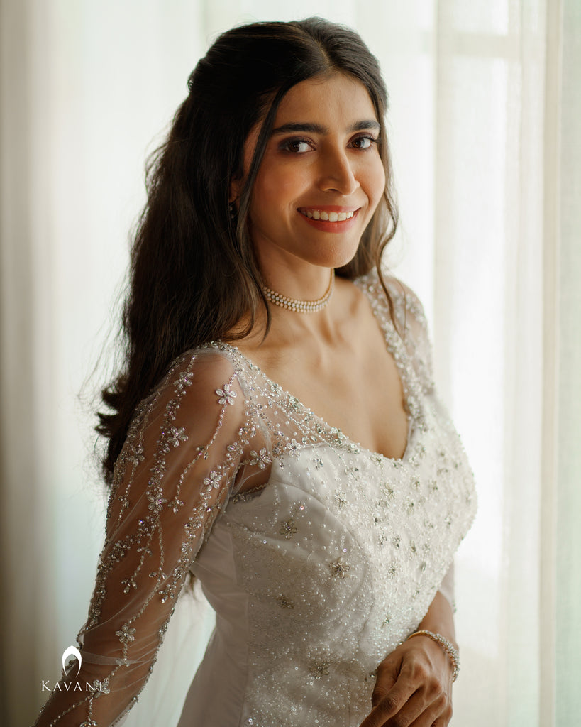 Signature bridal mermaid gown with hand work over the embellished lace fabric
