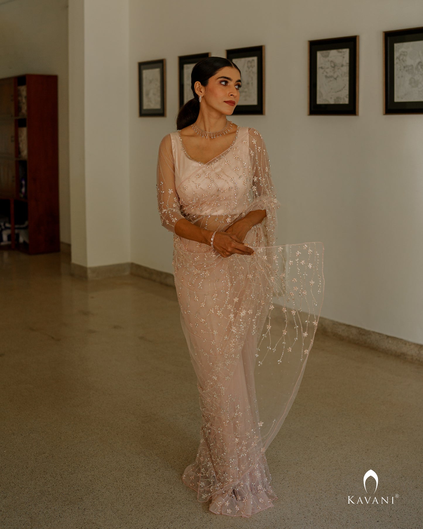 Our bride stunning in her pastel saree with beautiful  floral hand embroidery