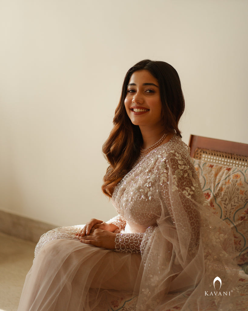 Wedding saree in a dusty nude pink shade with beautiful handwork