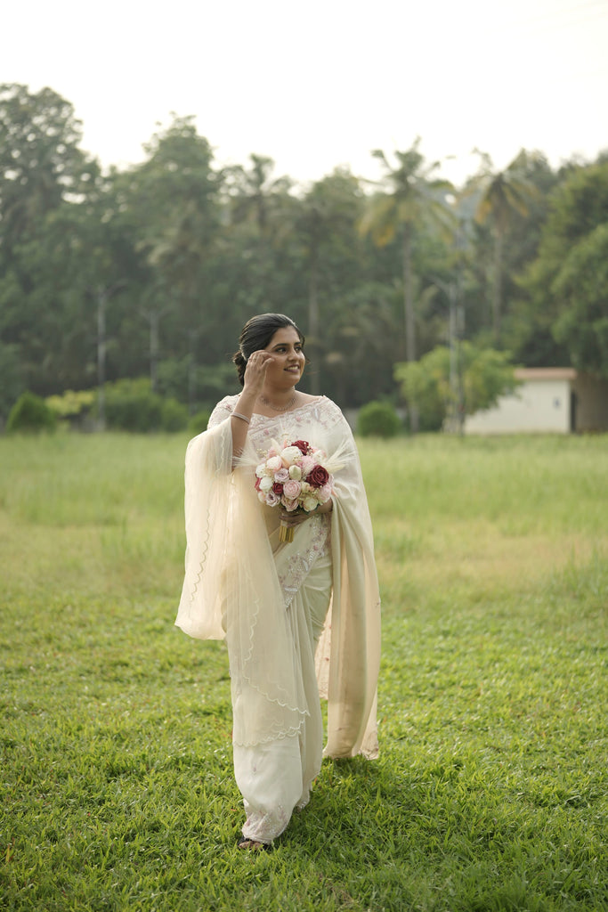 Soft White Net Saree with Pink & Purple Embellished Borders