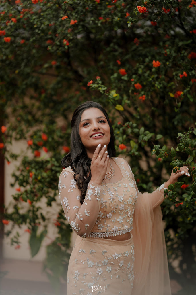 Pastel Orange Intricately Beaded Lehenga Set with Matching Veil
