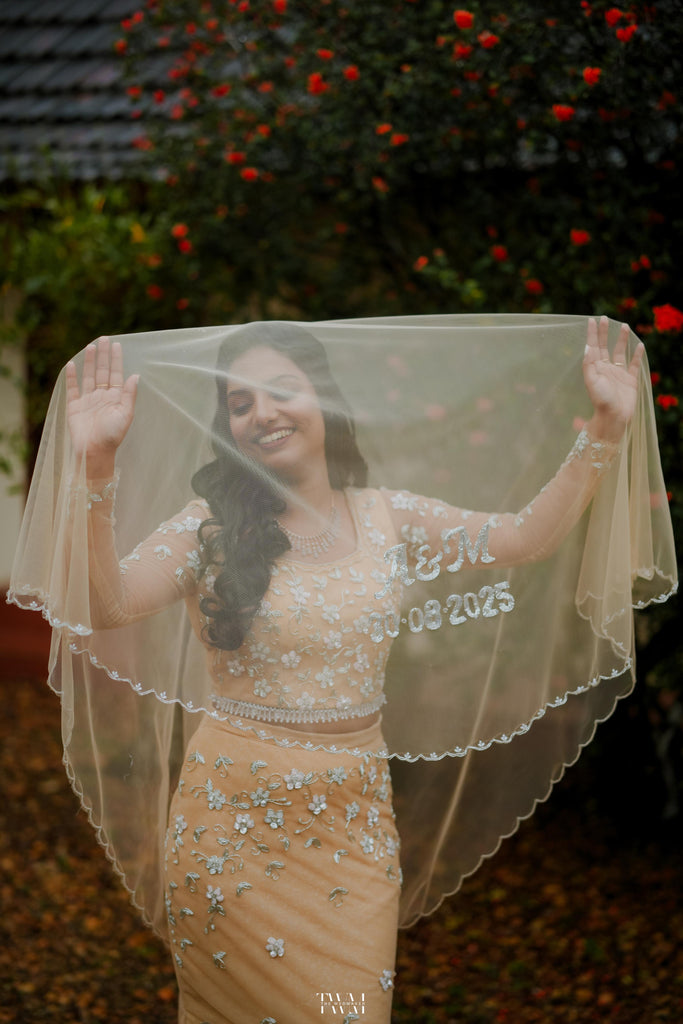 Pastel Orange Intricately Beaded Lehenga Set with Matching Veil