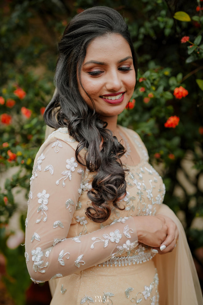 Pastel Orange Intricately Beaded Lehenga Set with Matching Veil