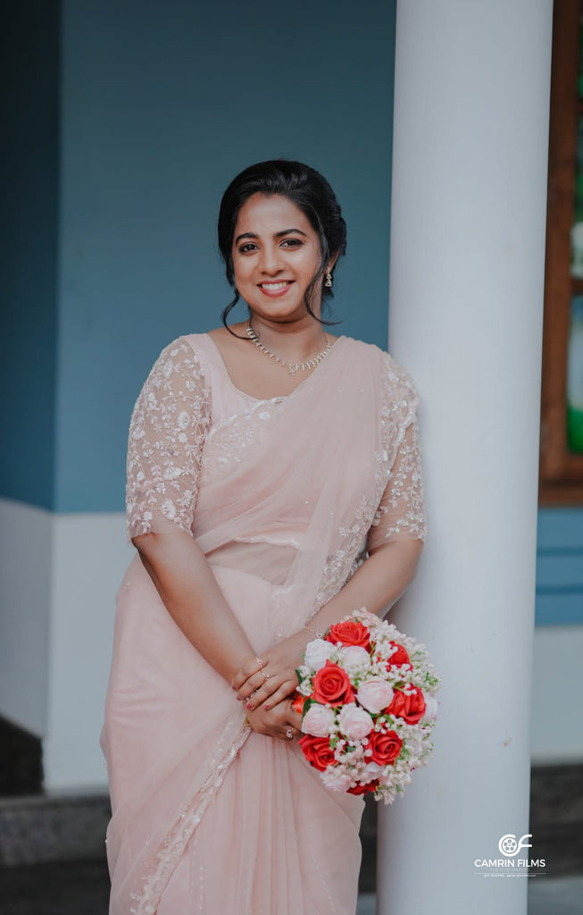 Peach Beaded Wedding Saree with Delicate Sleeve & Border Embellishments