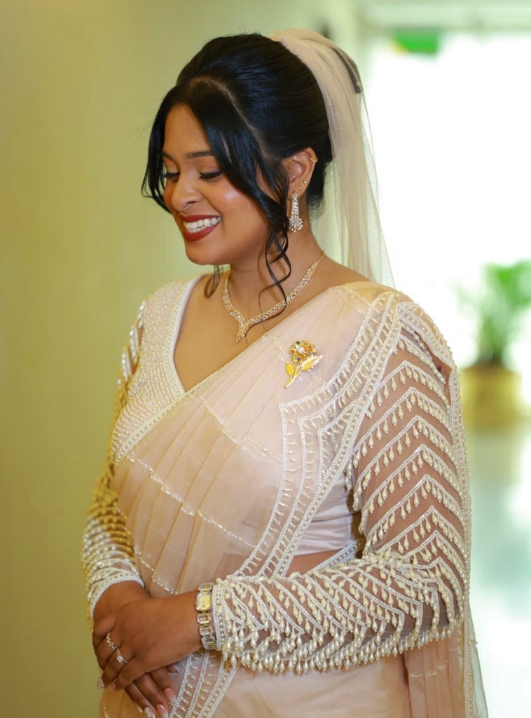 Blush Pink Saree with Pearl Beaded Blouse & Scalloped Borders with Veil
