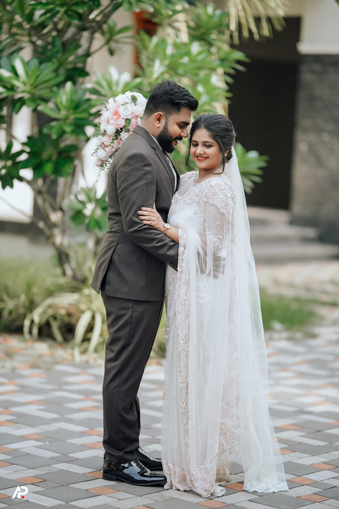 White Saree with Blush Pink Beaded Floral Detailing