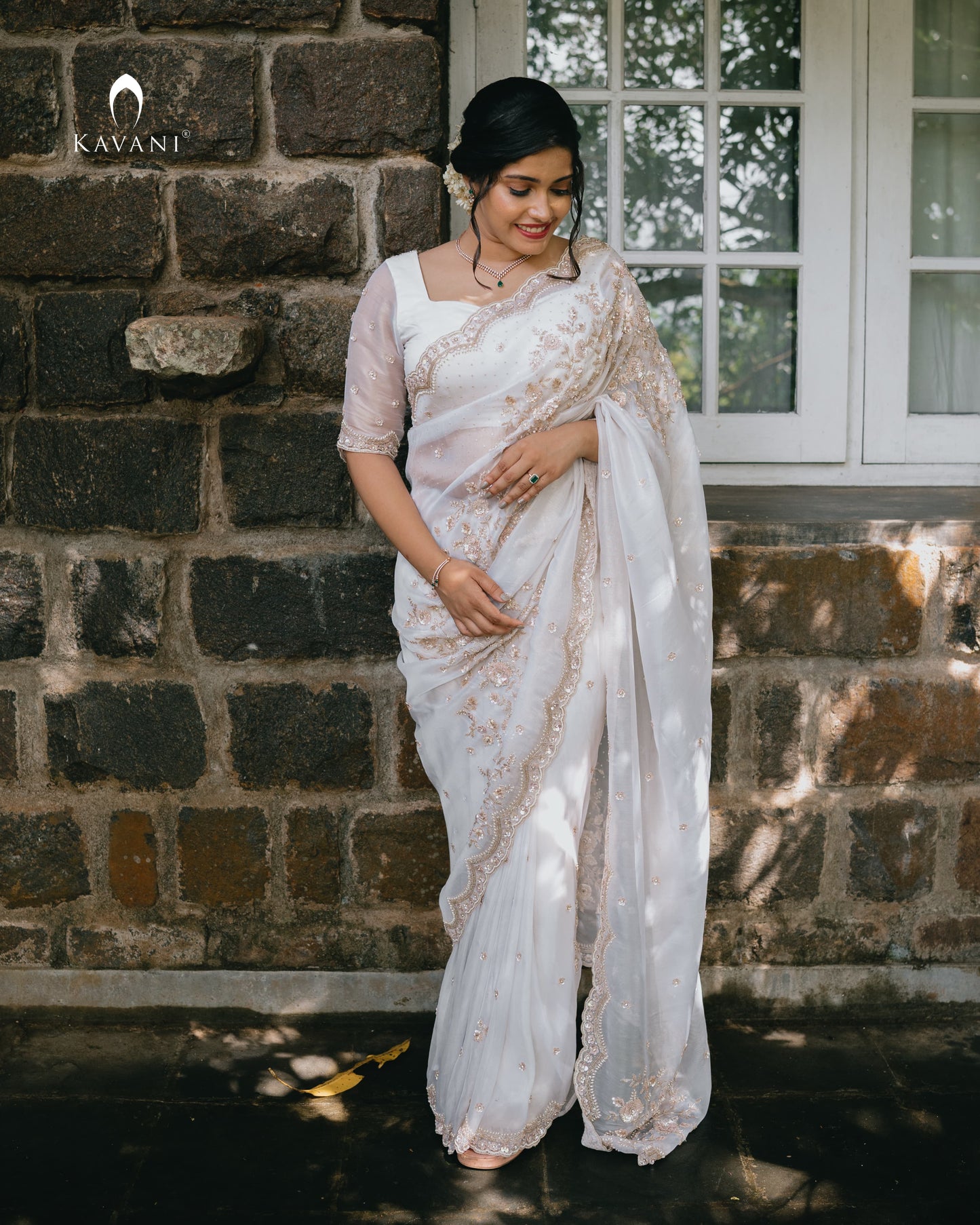 Signature  white bridal saree with beautiful light golden hand embroidery