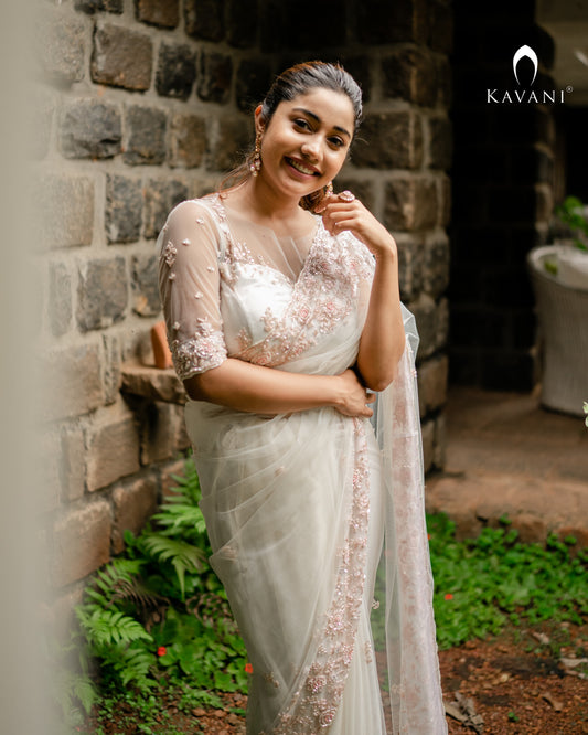 Our signature design white bridal saree with beautiful hand embroidery