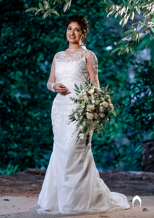 Signature Christian bridal A-line gown in net  carried by bride Maria