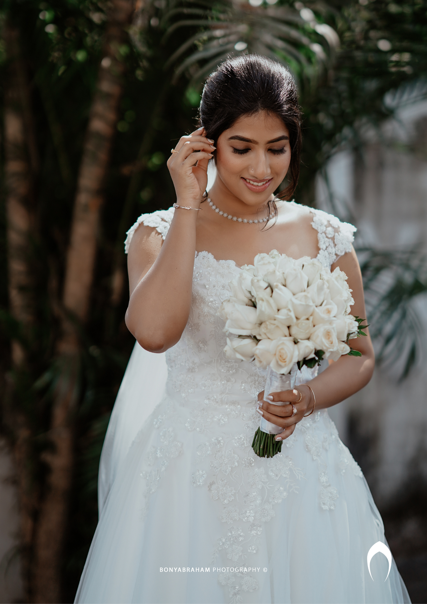 Signature Christian bridal  A-line  gown in net carried by bride Elizabeth